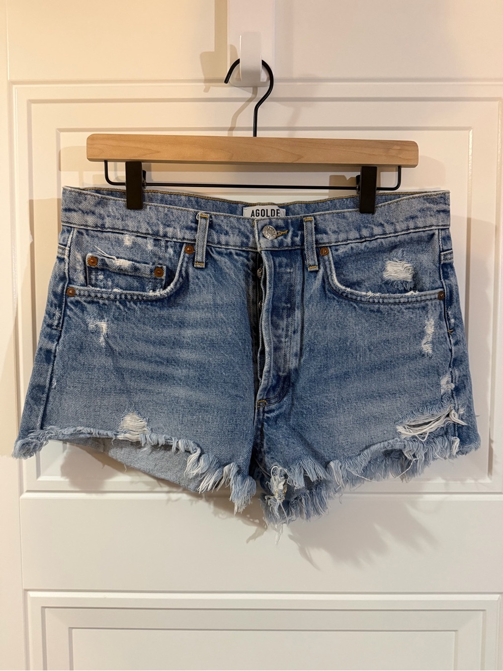 Agolde Light Wash Distressed Cutoff Denim shorts in size 27